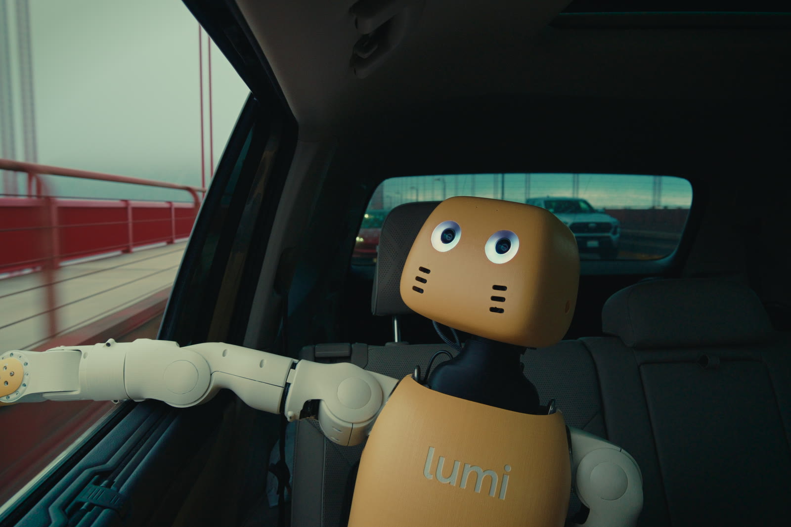 Lumi changing its expressive eyes while riding in a car